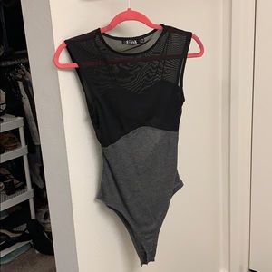 Black and grey body suit